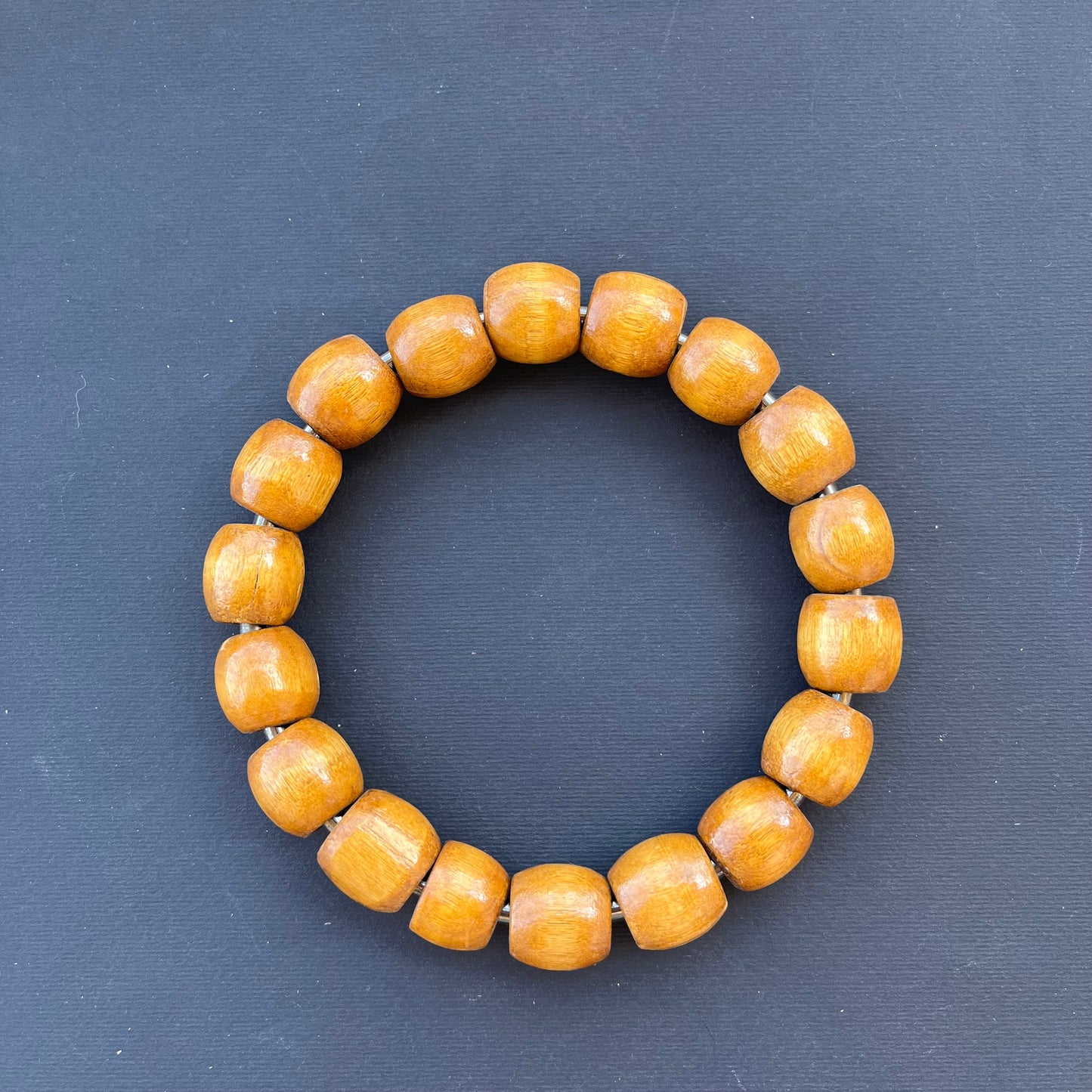 يد شنطة خرز خشب